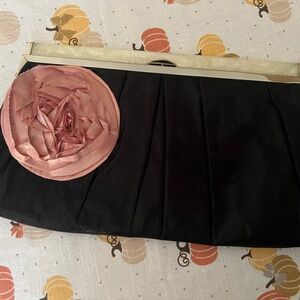 Black satin clutch with rose